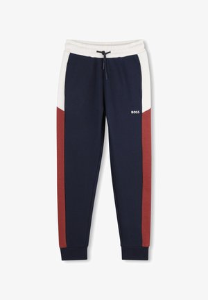 Marineblauwe joggingbroek met witte tailleband en witte en roestrode strepen aan de zijkant, met een zwart trekkoord en een klein wit BOSS-logo.
