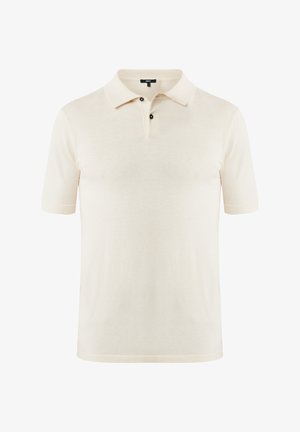 Polo shirt beige à manches courtes en tissu doux. Présente un col classique, une patte de boutonnage à trois boutons et une finition texturée subtile.