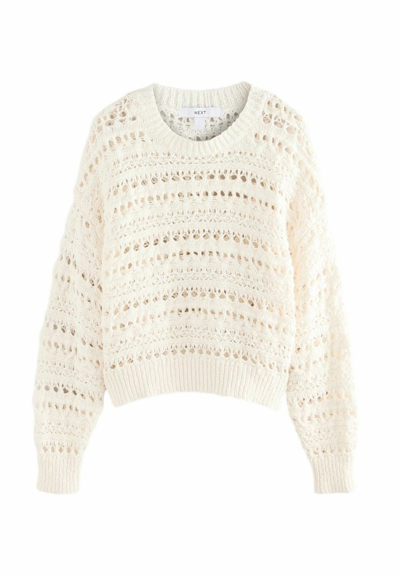 Pull en grosse maille couleur crème avec des rayures ajourées, des poignets et un ourlet côtelés, et un col rond étiqueté « NEXT ».