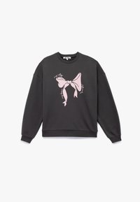 Sort sweatshirt lavet af bomuld, med et stort pink sløjfe grafik på forsiden og tekst i kursiv. Ribbet manchetter og kant.