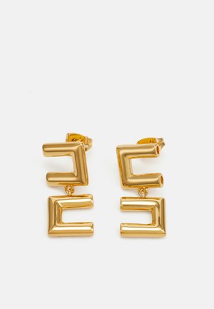 Pair of gold-toned geometric drop earrings with two connected open rectangular shapes on a white background.
