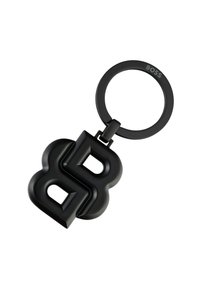Black rubber keychain featuring interlocking letters "B" and "8" with a smooth texture and a circular attachment ring. Brand name "BOSS" visible.