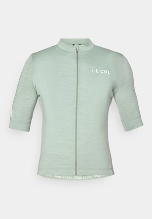 Jasnozielona koszulka rowerowa z krótkim rękawem, z zamkiem błyskawicznym z przodu, odblaskowym logo i minimalistycznym designem; teksturowana tkanina o dopasowanym kroju.