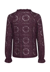 Blusa in pizzo bordeaux con maniche lunghe, caratterizzata da un motivo floreale e dettagli testurizzati. Scollo arricciato e polsini elasticizzati.