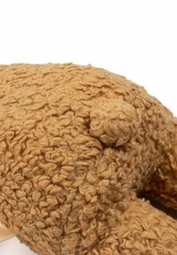 Soft plush toy in light brown, textured fur with a round, protruding tail. Features a plush, cuddly body and no visible hardware or accents.