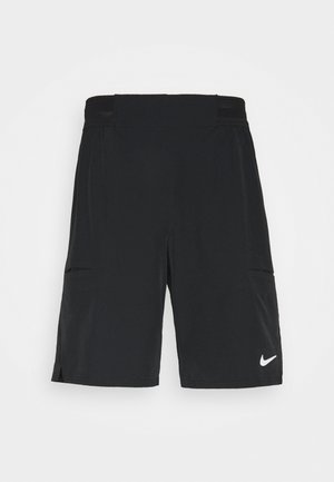 Sorte atletikshorts med elastisk talje og sidelommer, med en lille hvid Nike swoosh-logo på det nederste højre ben.