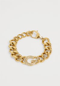 Gouden armband met grote schakels, een kreeftenhaak en een ronde accent met een "G" versierd met heldere strassstenen.