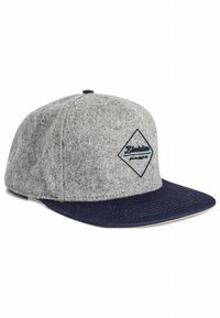 Gray wool baseball cap with a navy brim and logo patch. Features a structured shape and flat peak, ideal for casual wear.