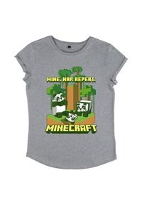 Szary bawełnowy T-shirt z krótkimi, podwiniętymi rękawami, z grafiką nawiązującą do gry Minecraft, przedstawiającą postacie oraz tekstem "MINE. NAP. REPEAT." w kolorze zielonym.