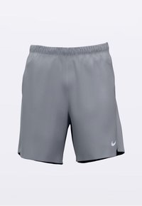 Šedé atletické šortky s elastickým pasem, vyrobené z lehké látky, s malým bílým logem Nike na spodní levé noze.