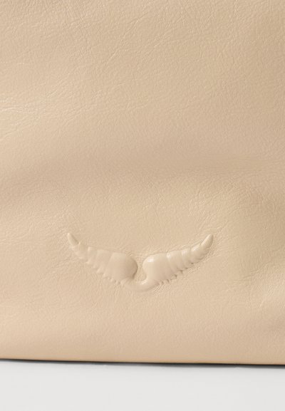 Beige leather bag featuring a embossed wing logo, smooth texture, and subtle grain detail. Simple design with no additional hardware.