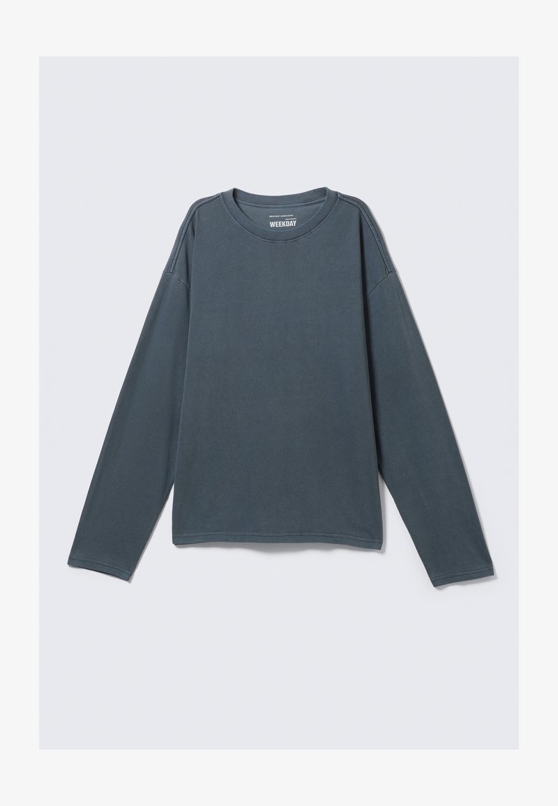 Μακρυμάνικη μπλούζα crewneck σε σκούρο τυρκουάζ από βαμβάκι, με πτωτούς ώμους, άνετη εφαρμογή και ορατές ραφές.