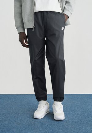 PANT - Pantalon de survêtement - black