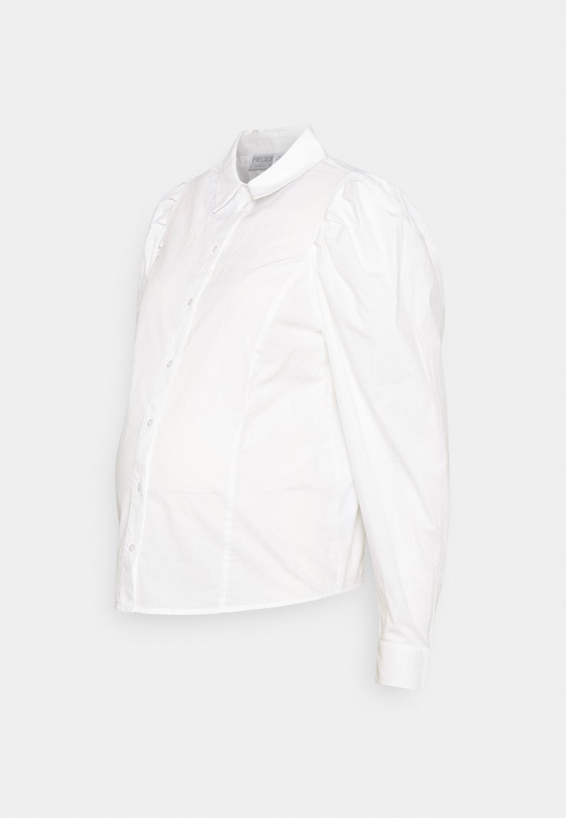 Camisa branca de botão com mangas bufantes, feita de algodão. Apresenta um colarinho clássico e um corpo ajustado com uma barra arredondada.