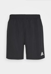 Pantalones cortos deportivos negros con cintura elástica, confeccionados en una tela suave. Presenta un pequeño logo blanco de Adidas en la parte inferior derecha.