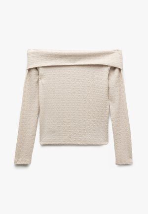 Bluzka z długim rękawem o dekolcie typu off-the-shoulder wykonana z teksturowanej beżowej tkaniny, charakteryzująca się dopasowanym krojem i prążkowanymi detalami wzdłuż dekoltu oraz rękawów.