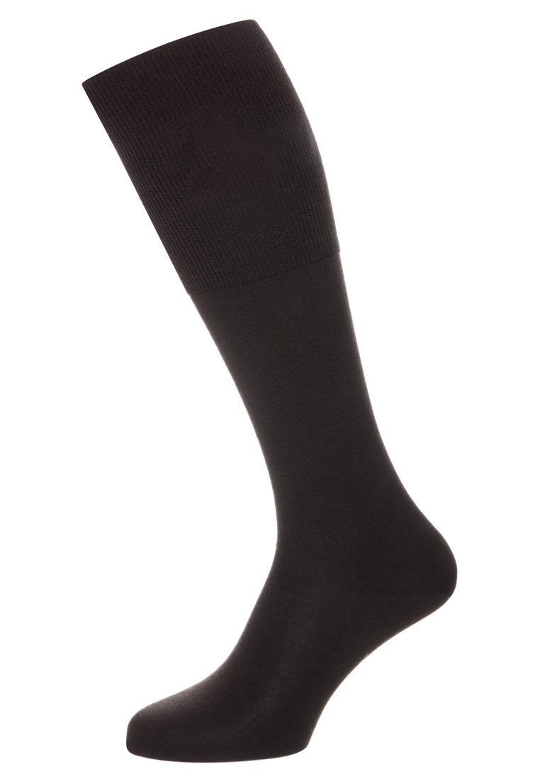 Calza nera fino al ginocchio realizzata in materiale liscio con un risvolto a costine nella parte superiore e una design senza cuciture alla punta, che offre una vestibilità aderente.
