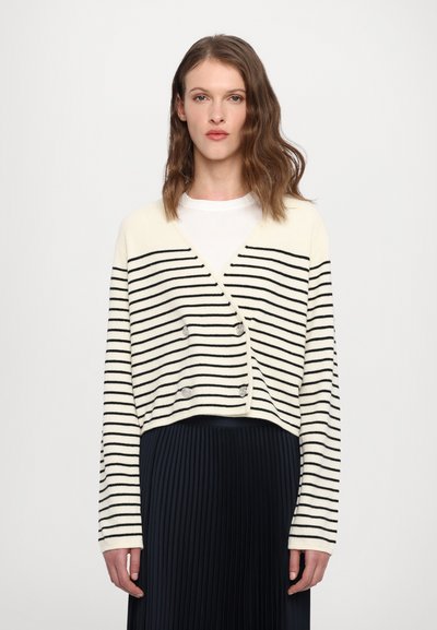 Cropped cardigan in cream with black vertical stripes, featuring a V-neck, long sleeves, and double-button closure at the front.