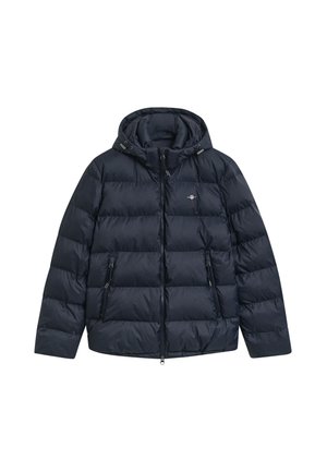 Marineblauer Pufferjacke mit Kapuze, versehen mit einem Reißverschluss, zwei seitlichen Taschen und einem gesteppten Design zur Isolierung. Glatte Textur, glänzende Optik.