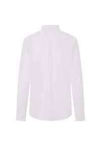 Camisa blanca de manga larga hecha de algodón. Presenta un collar clásico y puños con botones, con una textura suave. Corte recto con un plisado en la parte posterior.