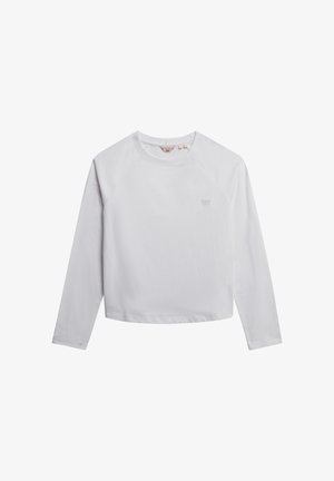 White long-sleeve shirt with a crew neckline, made of soft cotton. Features raglan sleeves and subtle branding on the front left.