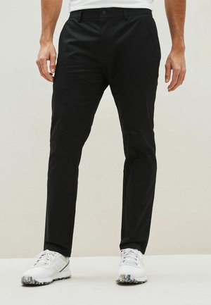 SLIM FIT SHOWER RESISTANT - Chino kalhoty - black