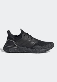 Scarpa da corsa nera con tomaia in knit testurizzato, suola in gomma nera, logo a tre strisce prominente e design della suola intermedia imbottita.