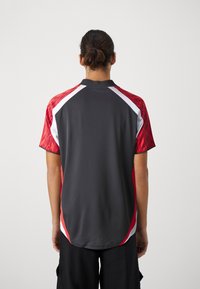 Puma FOOTBALL UNISEX - Triko s potiskem - black