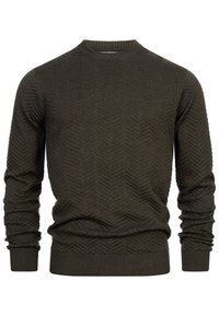 Dunkelgrüner Pullover mit einem strukturierten Zickzackmuster, gerippten Bündchen und Saum sowie einem runden Ausschnitt. Hergestellt aus Strickmaterial.