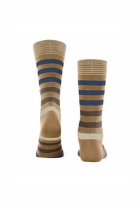 Brązowe skarpetki z poziomymi paskami w kolorze granatowym, kremowym i ciemnobrązowym. Teksturowany górny brzeg z żebrowanym wzorem. Miękki materiał zapewniający komfort.