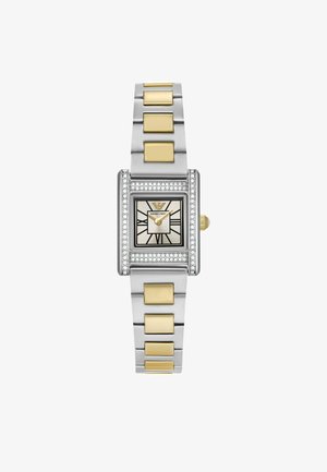 Gold- und Silberuhr mit rechteckigem Gehäuse, Kristallakzenten und einem hellgoldenen Zifferblatt mit schwarzen Stundenmarkierungen. Metallarmband mit abwechselnden Gliedern.