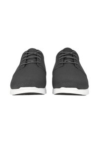 Gray mesh sneakers with a round toe, lace-up front, and white rubber sole. The upper features a textured pattern for breathability.