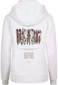Sudadera blanca con un gráfico de dos palomas en vuelo, texto "Ave de Paz" en marrón y elementos decorativos. Tejido suave con un corte relajado.