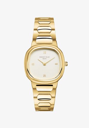 Montre en or avec un cadran octogonal arrondi, un cadran blanc et des index horaires dorés. Elle présente un bracelet en maillons épais. Nom de la marque : Rosefield.