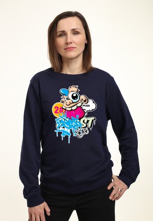 Námořnická mikina s barevným grafickým motivem s karikaturou psa, textem a graffiti designem; bavlněný materiál s dlouhými rukávy a kulatým výstřihem.