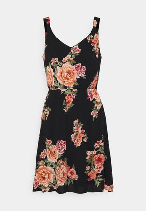 Robe noire sans manches avec col en V et motif floral pêche et rose.