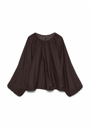 Tamsiai ruda, lengva blizgučio palaidinė su laisvu kirpimu, apvaliu iškirpimu ir plačiomis, varpeliams panašiomis rankovėmis. Lygus paviršius, be raštų ar matomų detalžių.