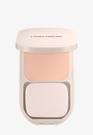 Compact beige powder with rectangular makeup sponge inside light beige case labeled "Laura Mercier" on lid.