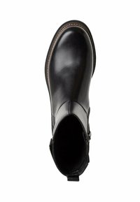 Bottine en cuir noir avec une finition lisse, bout rond, fermeture éclair sur le côté et couture marron le long de la semelle. Intérieur doublé pour le confort.