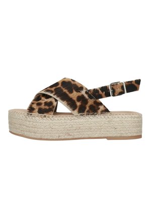 Kile-sandal med leopardprint, krydsende strop og justerbar spænde samt platformsål i flettet jute.