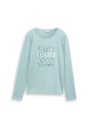 Svijetloplaka košulja dugih rukava od mekanog materijala, s natpisom "prelijepo" u bijeloj boji, uz uzorak tirkiznih i plavih kapi u pozadini.