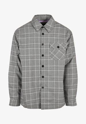 Hallast ruuduline särk, mis on valmistatud puuvillast, on varrukateta ja nupuga ees, pikkade varrukatega ning ühes rinna taskus on diagonaalne muster.