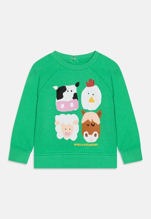 Felpa verde in cotone con applicazioni di animali: mucca, pollo, pecora e cavallo in uno stile giocoso e cartoonesco. Polsini e orlo a costine.