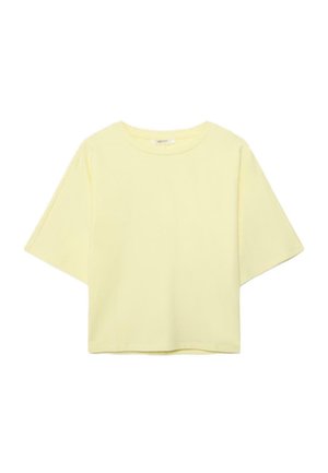 Krátke rukávy, bledozlté crop tričko so zaobleným výstrihom a voľným strihom, zobrazené na bielom pozadí.