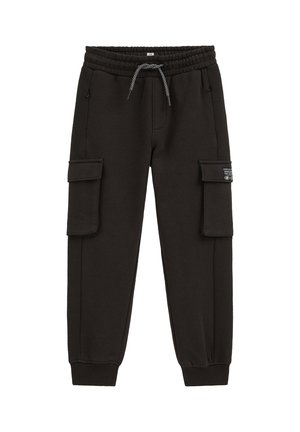 Pantalon cargo jogger noir avec taille élastique, cordon de serrage, poches latérales zippées, poches à rabat sur les cuisses et poignets côtelés aux chevilles.