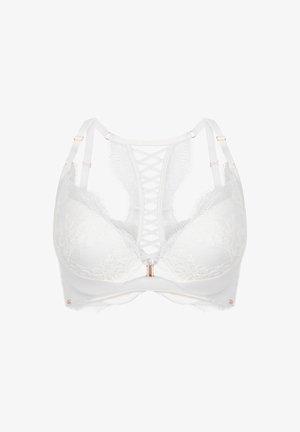 Weißer Spitzen-BH mit geformten Cups, einem dekorativen Kreuz hinten und Akzenten aus roségoldenen Hardware-Elementen. Weicher Stoff mit floralen Mustern.
