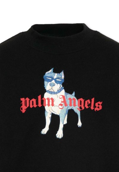 Chemise noire avec un graphisme représentant un chien bleu et blanc portant des lunettes de soleil et un collier à pointes, sur lequel est superposé un texte rouge "palm Angels".