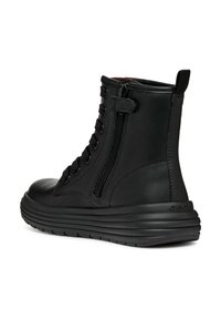 Czarne skórzane botki za kostkę z sznurowanym przodem, bocznym zamkiem, na słupku i gładką teksturą. Posiadają minimalne oznakowanie na pięcie.