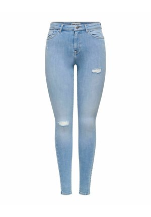 Jean skinny taille haute bleu clair avec des patchs usés sur la cuisse droite et le genou gauche, équipé de poches avant et passants pour ceinture.