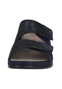 Navy blue open-toe sandal with adjustable straps, a textured upper, and a cushioned insole for comfort. Non-slip black outsole.